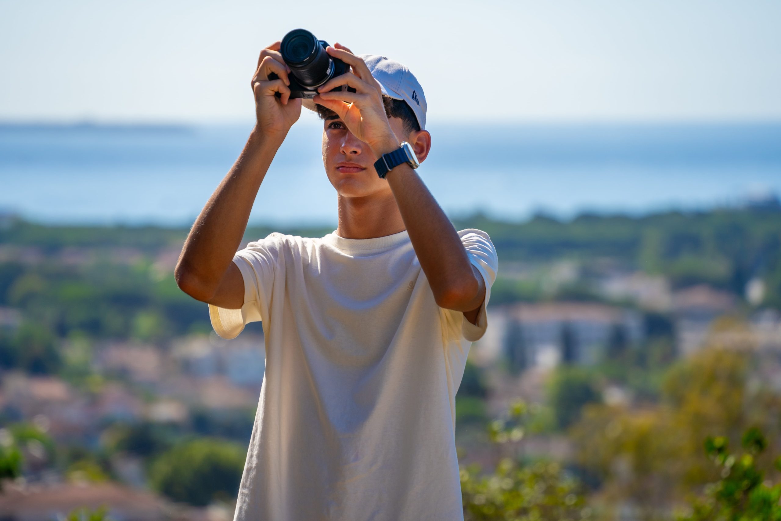Student busy with photography at best summer camp